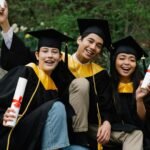 International student celebrating graduation and exploring graduate visa work rights UK