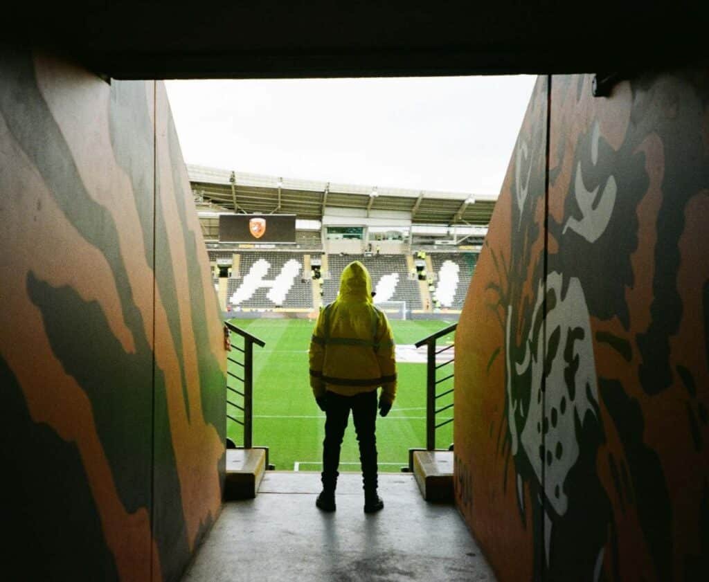 Crowd management and security work at a UK sports stadium